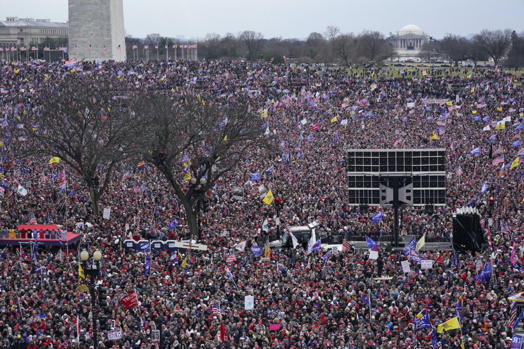 APTOPIX Electoral College Protests With the Washington Monument in the background, people attend a rally in support of President Donald Trump near the White House on Wednesday, Jan. 6, 2021, in Washington.