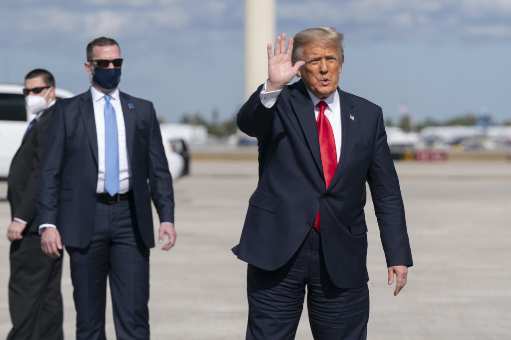 Donald Trump Former President Donald Trump waves to the members of the media
