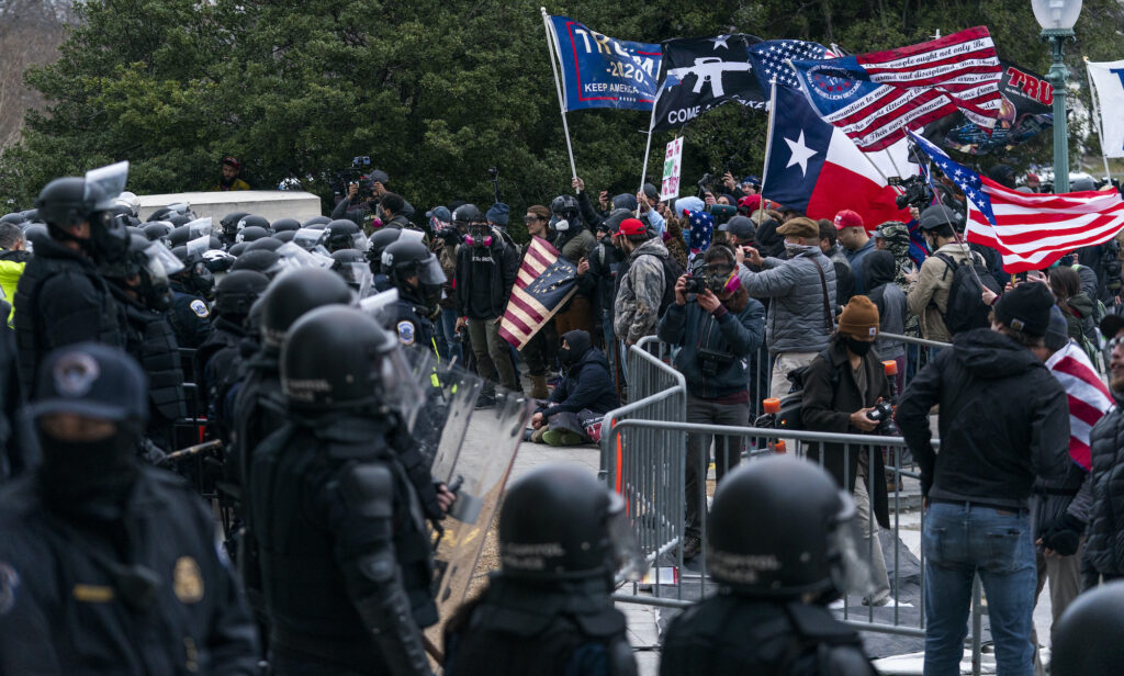 Pro-Trump insurrectionists clash with Capitol Police officers outside the Capitol