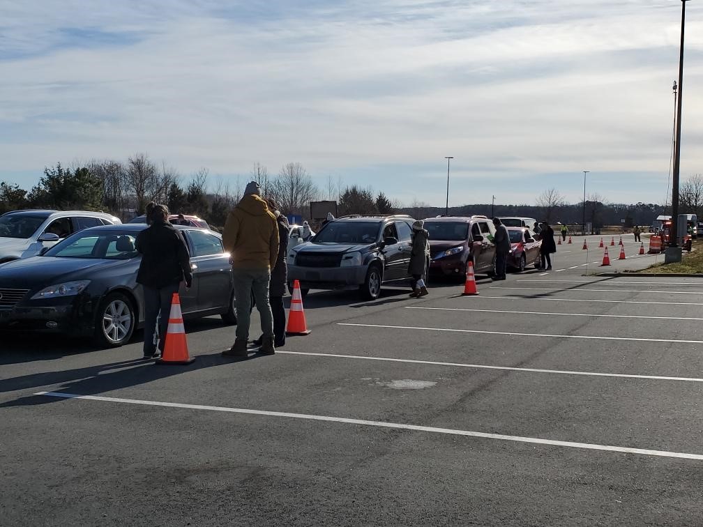 Esh3SntXUAQF1dG Long lines for COVID-19 vaccine distribution in Delaware spilled onto the highway on Saturday. (Delaware Department of Health and Social Services)