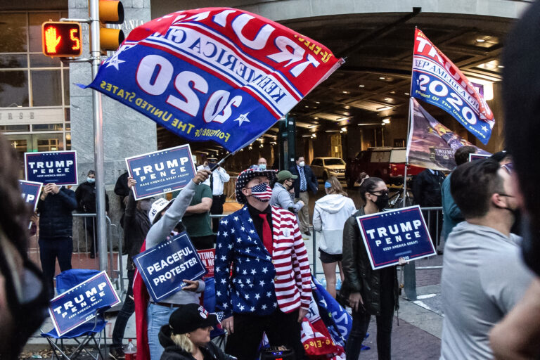About two dozen protesters gathered outside Philadelphia’s vote counting headquarters in support of President Trump