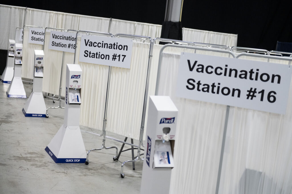 Governor Murphy Visits Middlesex Countyís Covid-19 Vaccination ‘Megasite’ Vaccination stations at the New Jersey Convention and Exposition Center Covid-19 vaccination site in Edison, New Jersey, U.S., on Friday, Jan. 15, 2021. New Jersey will expand Covid-19 vaccinations to people 65 years old and over and those ages 16 to 64 who have