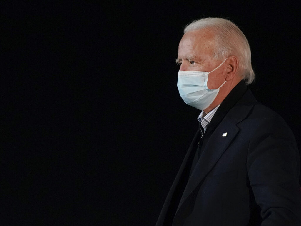 President-elect Joe Biden at New Castle Airport in New Castle, Del., last month. President-elect Joe Biden wearing a face mask