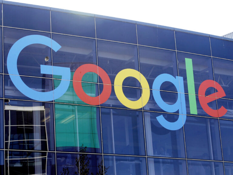 A sign is shown on a Google building at their campus in Mountain View, Calif.