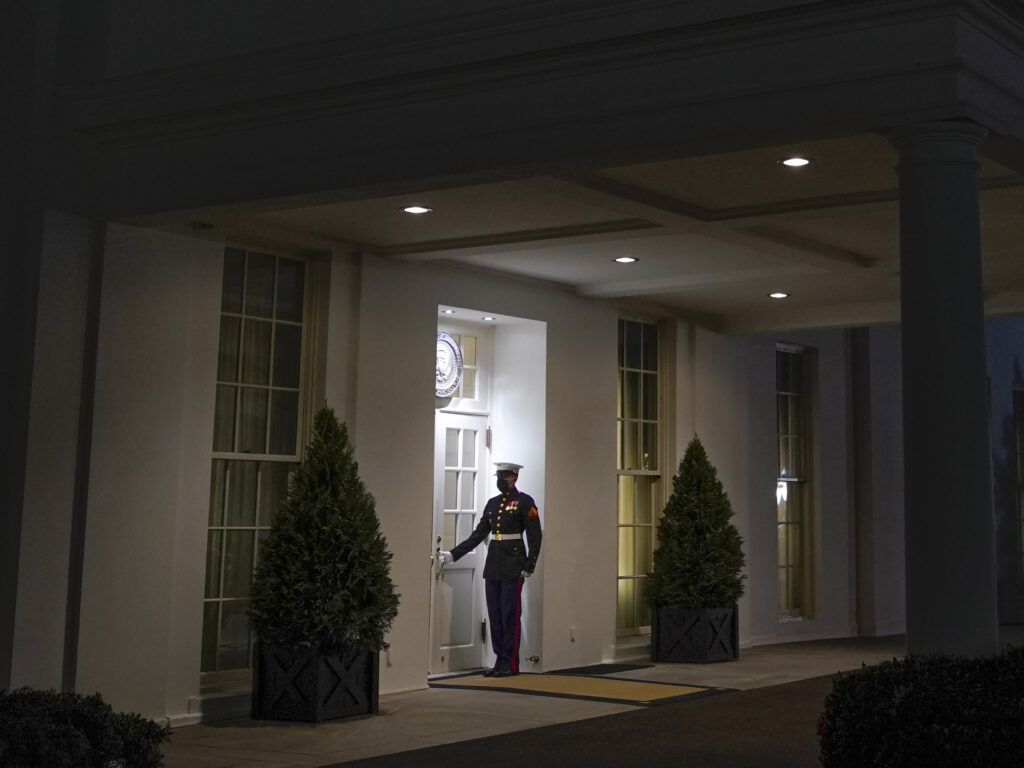 A Marine stands outside the entrance to the West Wing of the White House, signifying President Donald Trump is in the Oval Office, on Thurs., Jan. 7, 2021. A Marine stands outside the entrance to the West Wing of the White House, signifying President Donald Trump is in the Oval Office, on Thurs., Jan. 7, 2021. (Patrick Semansky/AP Photo)