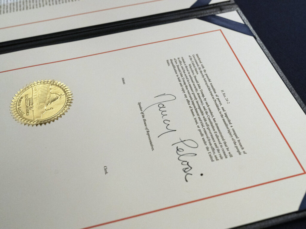Trump Impeachment House Speaker Nancy Pelosi's signature is seen on the single article of impeachment against President Trump.