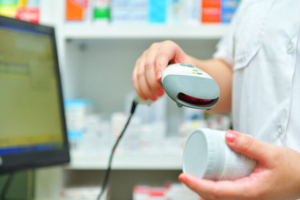 bigstock-Pharmacist-Scanning-Barcode-Of-309057727 Pharmacist scanning barcode of medicine drug in a pharmacy drugstore