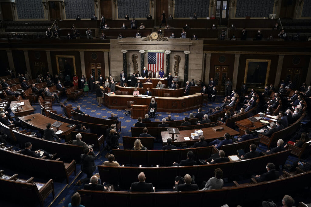 APTOPIX Congress Electoral College Speaker of the House Nancy Pelosi, D-Calif., and Vice President Mike Pence officiate as a joint session of the House and Senate convenes to confirm the Electoral College votes cast in November's election