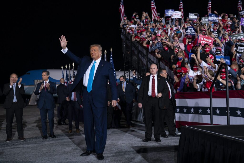President Donald Trump arrives for a campaign rally at Harrisburg International Airport, Saturday, Sept. 26, 2020, in Middletown. U.S. Rep. Lloyd Smucker, R-Lancaster/York, is at far left. (Evan Vucci/AP Photo)