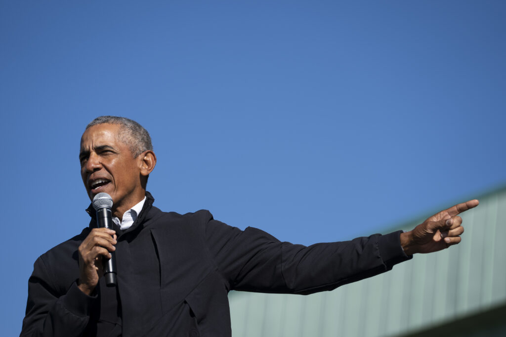 “For two months now, a political party and its accompanying media ecosystem has too often been unwilling to tell their followers the truth,” former President Barack Obama said on Wednesday. Obama is seen here in October 2020. President Obama extends his arm while speaking into a microphone