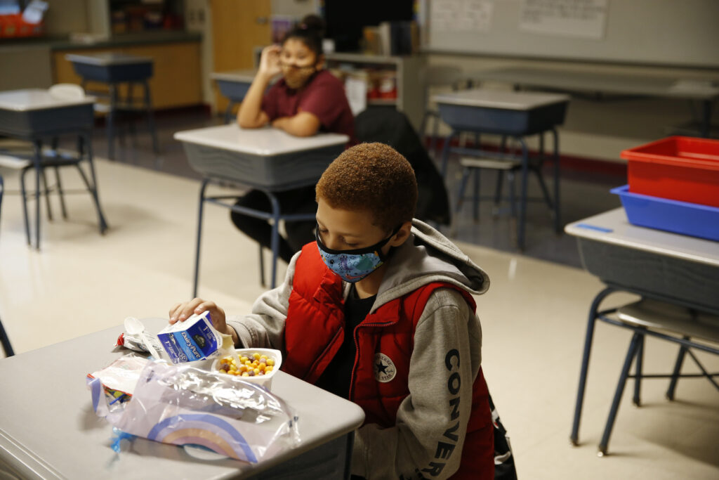 A fourth-grader eats breakfast at Mary L. Fonseca Elementary School in Fall River, Mass. A fourth-grader eats breakfast at Mary L. Fonseca Elementary School in Fall River, Mass.