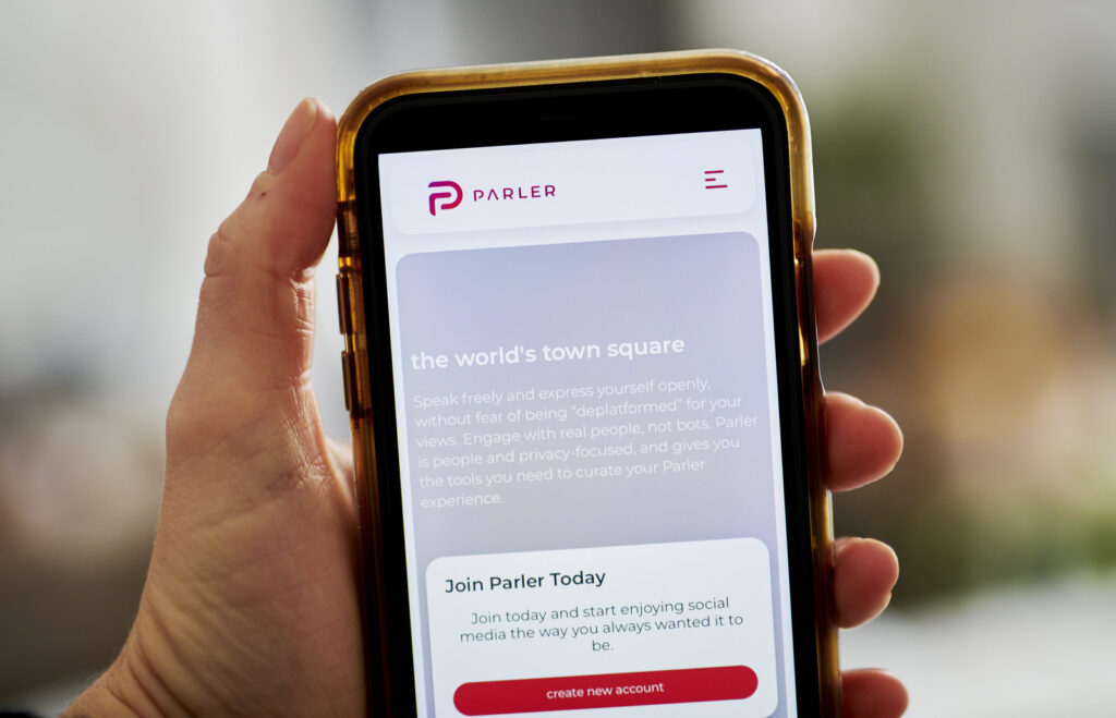 Parler CEO Says Platform Protects User Data And Speech The Parler website home screen on a smartphone