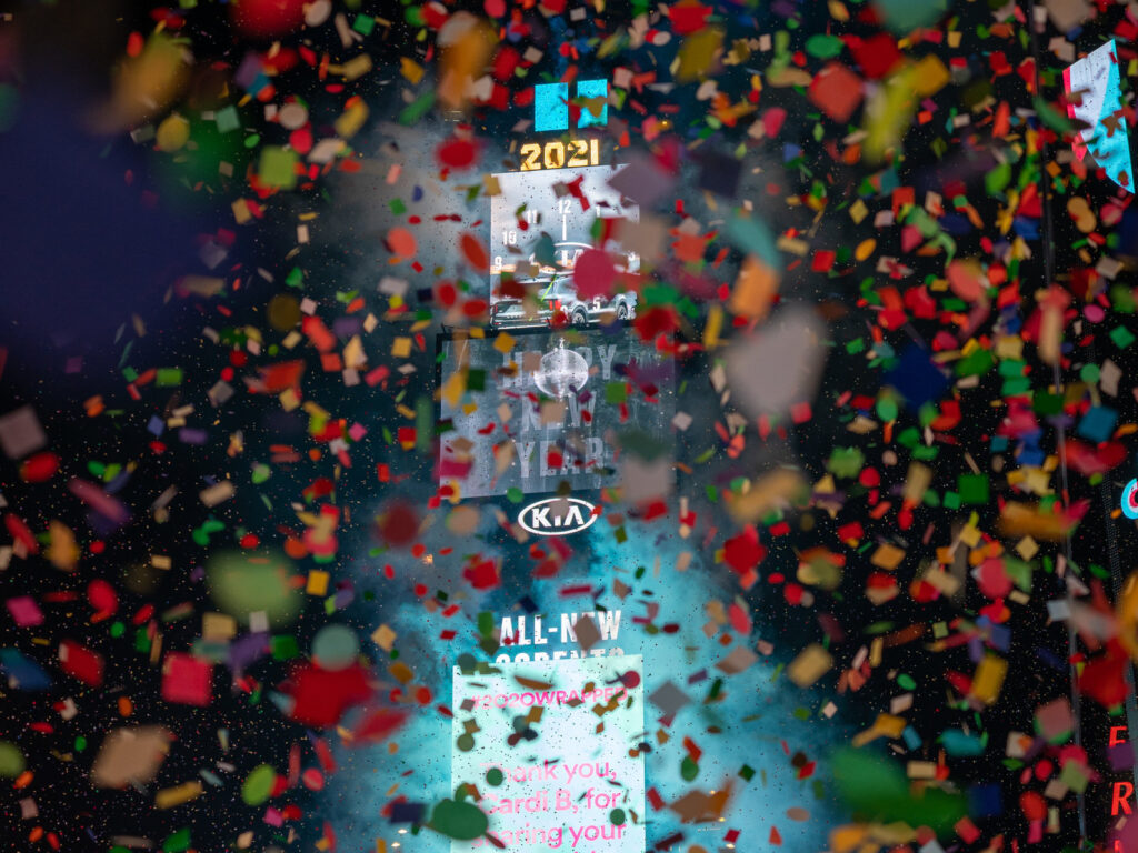 Changes Made To New Years Eve In Times Square Amid COVID-19 Pandemic Confetti falls in front of the New York Times Square 2021 ball drop