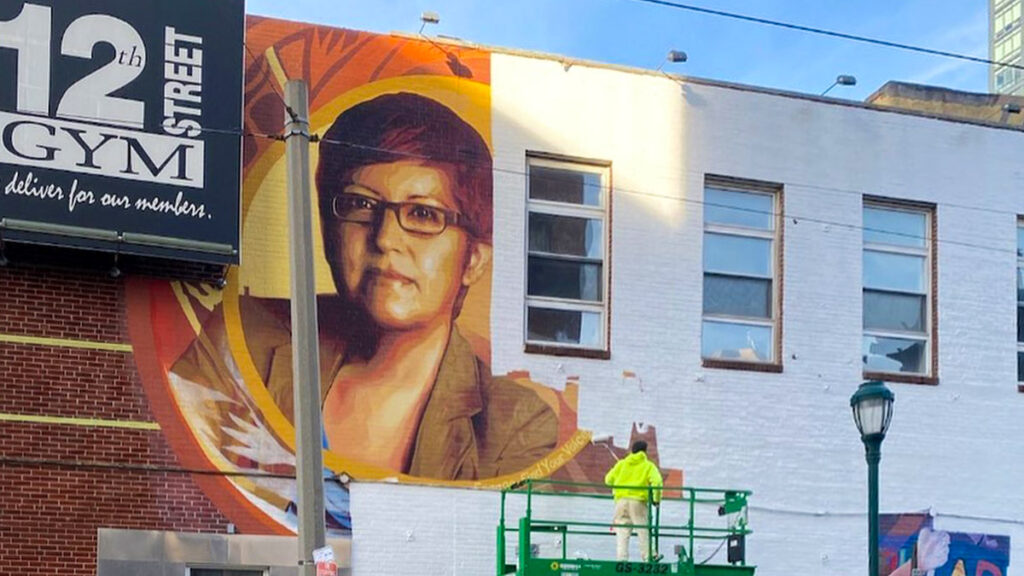 gloriacasarez-mural-whitewashed-crop The Gloria Casarez mural as it was being erased