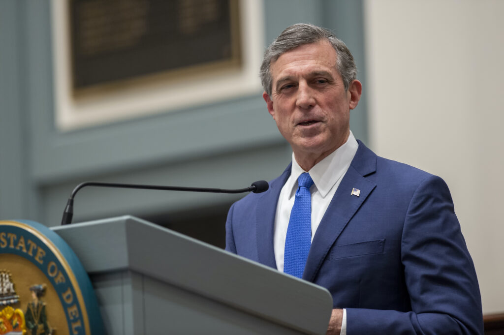 gov_john_carney_generic_02_012821 Delaware Gov. John Carney speaks at a podium