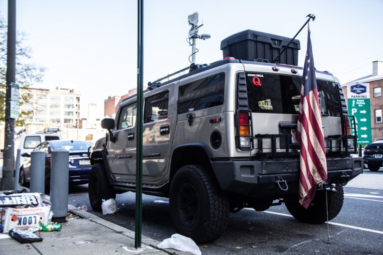 This Hummer was parked near the Pennsylvania Convention Center in November 2020. Inside, police found a semi-automatic rifle, ammunition, a lock-pick kit, among other items. (Kimberly Paynter/WHYY)