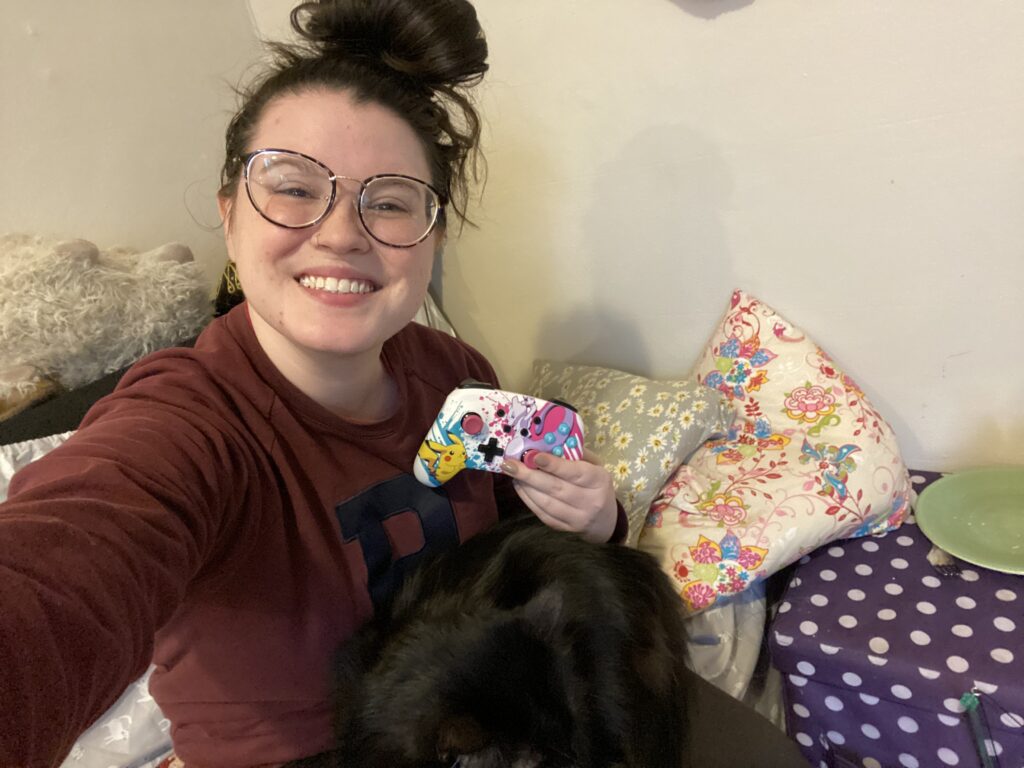 mackenzie_warren_NYE_010121 Mackenzie Warren prepping for her day of playing video games on Nintendo Switch and hanging out with her cat.