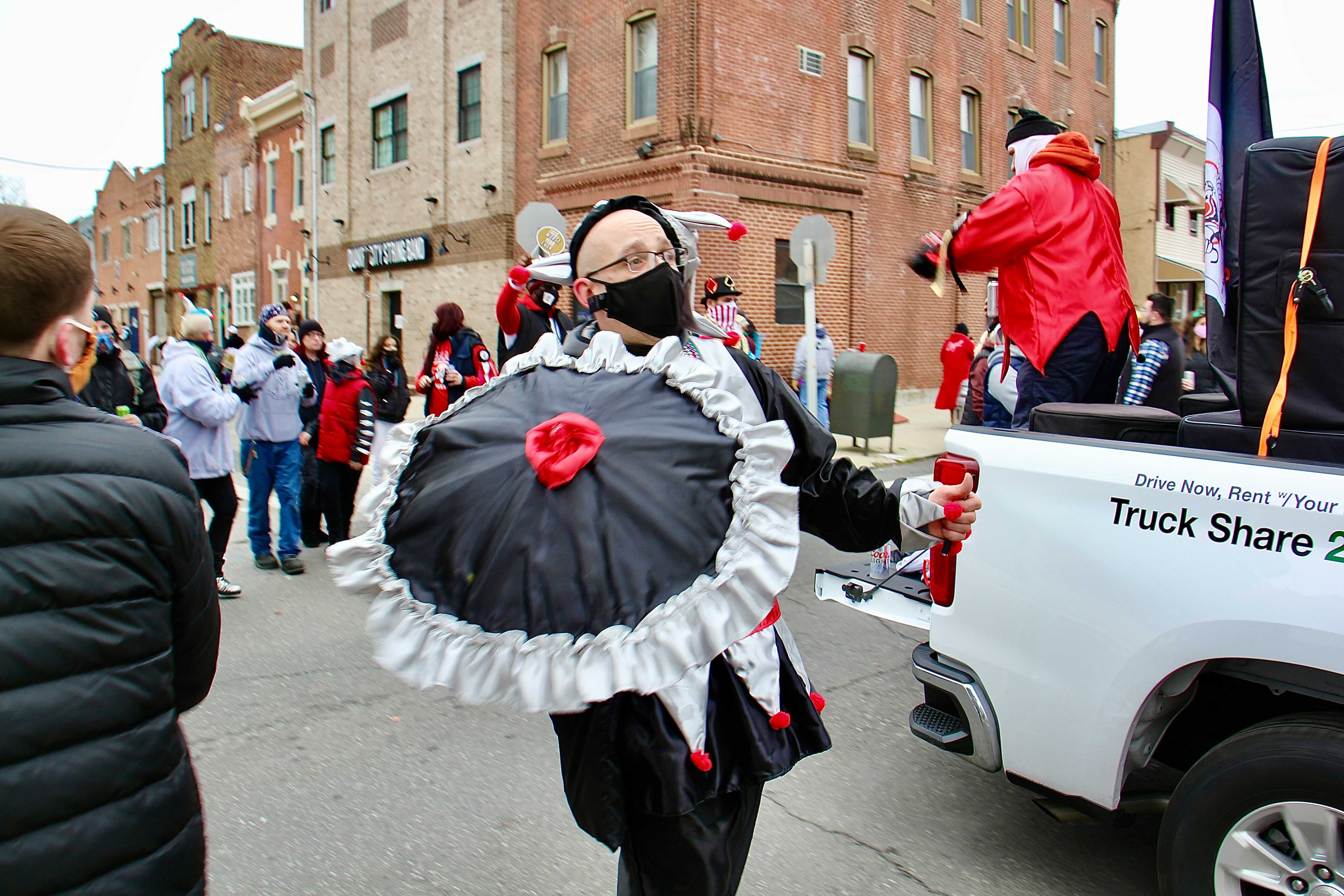 Mummers march on 3rd Street in protest of the cancellation of their annual New Year’s Day parade.