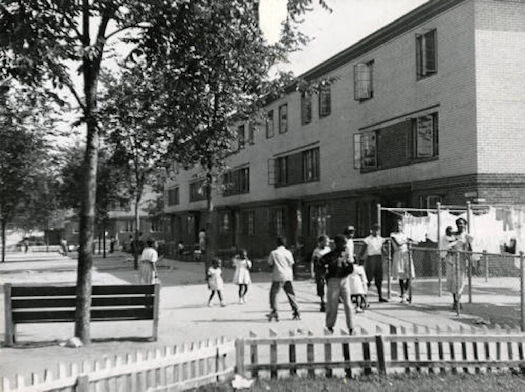 richard_allen_homes_011721 Residents are pictured in the courtyard of Richard Allen Homes