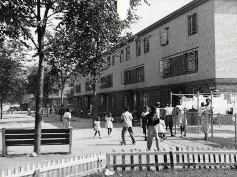 Residents are pictured in the courtyard of Richard Allen Homes