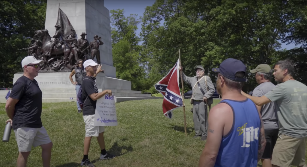 scott_hancock_monument_011821 Scott Hancock speaks in front of the Virginia monument in this still from the upcoming documentary