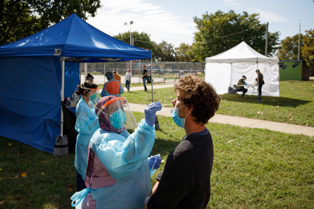 2009_seamaac_msptesting-3227 A volunteer administers a COVID-19 test in Mifflin Square Park