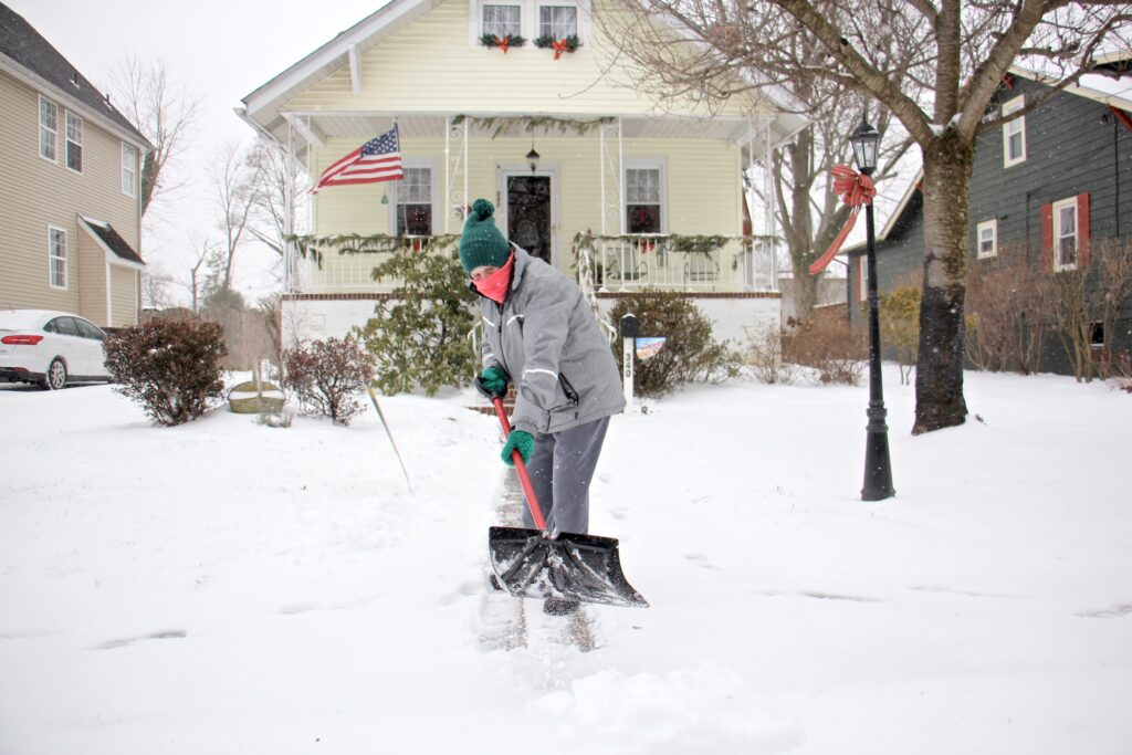 2021 02 01-e lee-moorestown nj-snow shovel A Moorestoown, N.J., resident clears the snow in front of her house