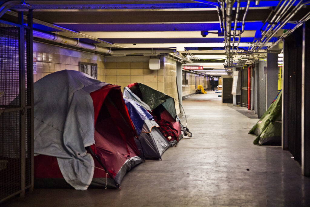 2021 02 23 k paynter locust street patco encampment-5 Tents and sleeping bags line the tunnels of the Locust Street Patco Station in Center City on Feb. 23, 2021. (Kimberly Paynter/WHYY)