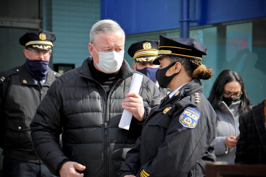 2021 02 26-e lee-jim kenney danielle outlaw-philadelphia-olney transportation center mass shooting presser Philadelphia Mayor Jim Kenney and Police Commissioner Danielle Outlaw confer during a press event at Olney Transportation Center, where a mass shooting occurred on Feb. 17, 2021. (Emma Lee/WHYY)