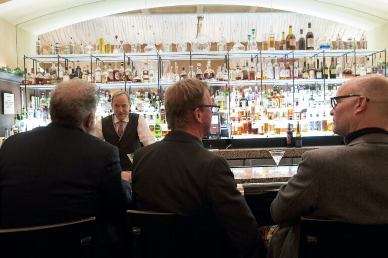 In this Tuesday, Nov. 27, 2018, photo, a bartender talks to a customer at the Gotham Bar and Grill in New York. (AP Photo/Mary Altaffer)