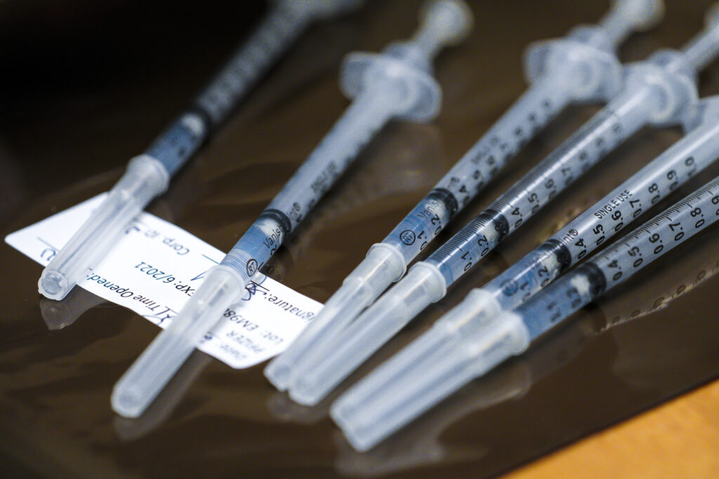 Virus Outbreak California COVID vaccine in syringes ready for inoculations. (Nelvin C. Cepeda/The San Diego Union-Tribune via AP, Pool)