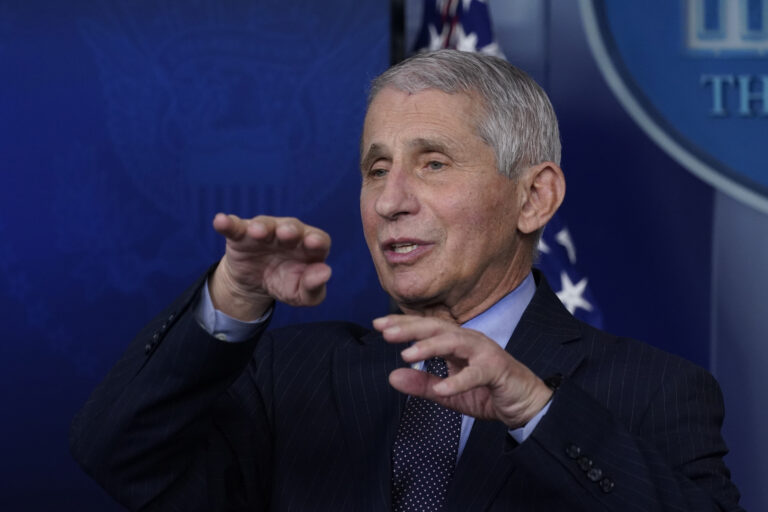 Dr. Anthony Fauci, director of the National Institute of Allergy and Infectious Diseases, speaks with reporters in the James Brady Press Briefing Room at the White House, Thursday, Jan. 21, 2021, in Washington. (AP Photo/Alex Brandon)