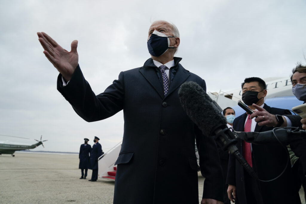Joe Biden President Joe Biden speaks to member of the media after exiting Air Force One, Friday, Feb. 19, 2021, in Andrews Air Force Base, Md. (AP Photo/Evan Vucci)