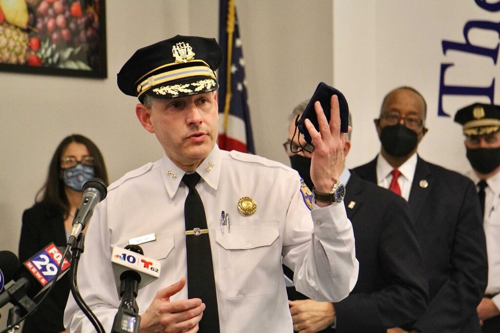 Image from iOS (28) Philadelphia police Inspector Ben Naish talks about the difficulty of identifying the suspects involved in the mass shooting at Olney Transportation Center during an update for reporters at Mathematics, Civics, & Sciences Charter School of Philadelphia, 447 North Broad Street. (Emma Lee/WHYY)