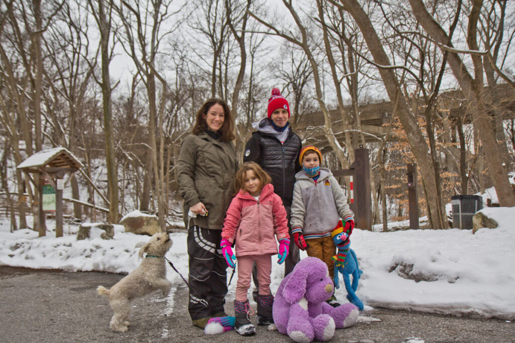 KINDER 2021 02 11 k paynter reilly family at the wissahickon-1200_800 Rachael and Phil Reilly with their children Winnie, 6, and Caden, 8, and dog Rosie, before taking a walk along the Wissahickon Creek in Philadelphia, Pa. (Kimberly Paynter/WHYY)