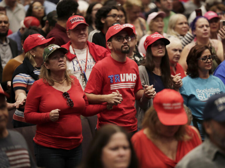 Supporters of President Donald Trump pray during a rally for evangelical supporters at the King Jesus International Ministry church, Friday, Jan. 3, 2020, in Miami. (Lynne Sladky/AP)