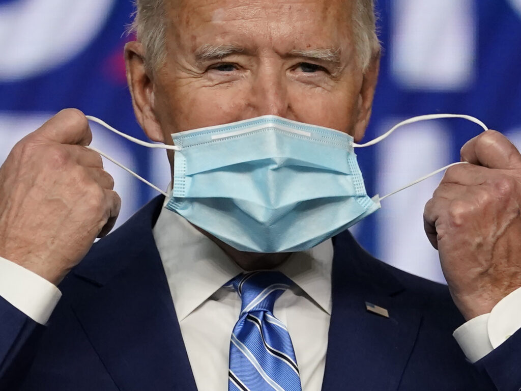 President Joe Biden, pictured on the campaign trail in Nov. 2020, has long encouraged Americans to mask up in the fight against COVID-19. On Wednesday, his administration announced it will provide 25 million masks to community health centers and food banks across the country. President Joe Biden, pictured on the campaign trail in Nov. 2020, has long encouraged Americans to mask up in the fight against COVID-19. On Wednesday, his administration announced it will provide 25 million masks to community health centers and food banks across the country. (Carolyn Kaster/AP)