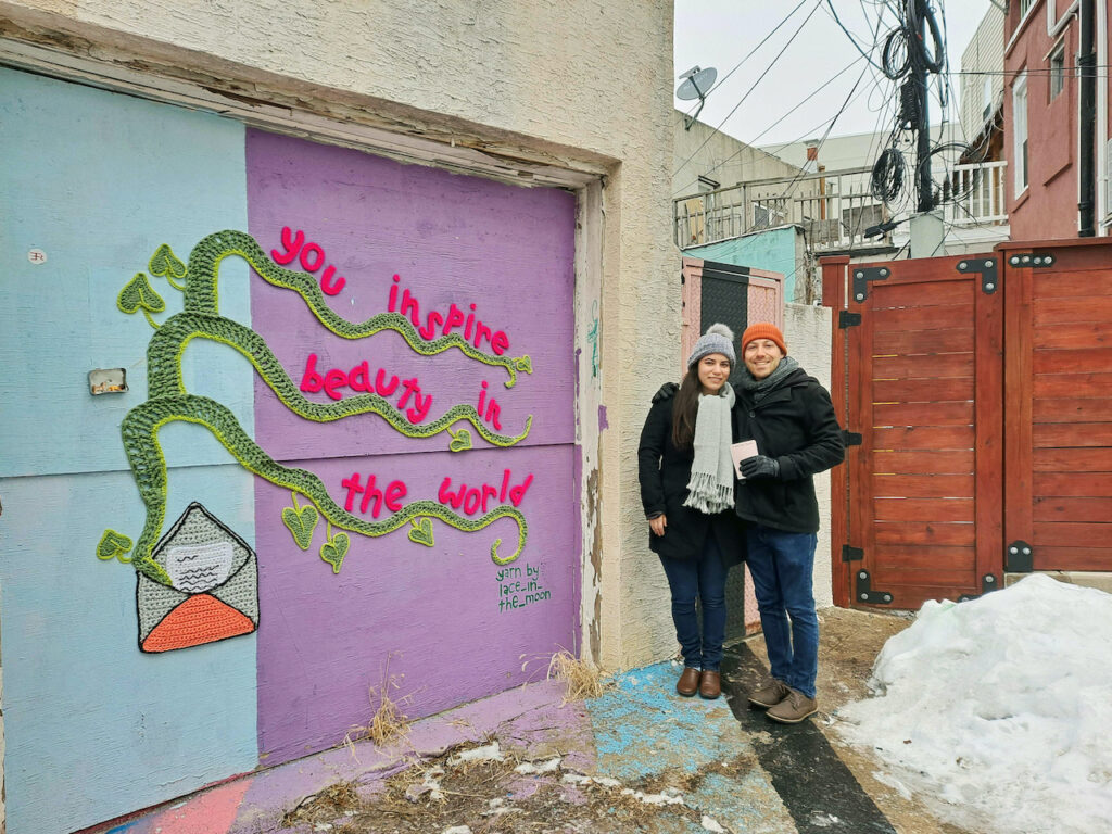 engagement_murals_danielle_brief_jonah_adams_XC_021421_02 Danielle Brief and Jonah Adams stand next to a mural in South Philly