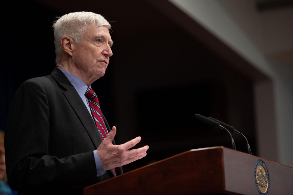 Frank Dermody speaks at a podium