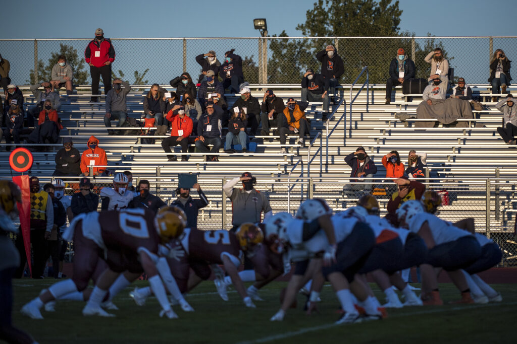 Fans watch the high school football game between Davison and Flint Powers Catholic on September 18, 2020 in Davison, Michigan. Fans watch the high school football game between Davison and Flint Powers Catholic on September 18, 2020 in Davison, Michigan.
