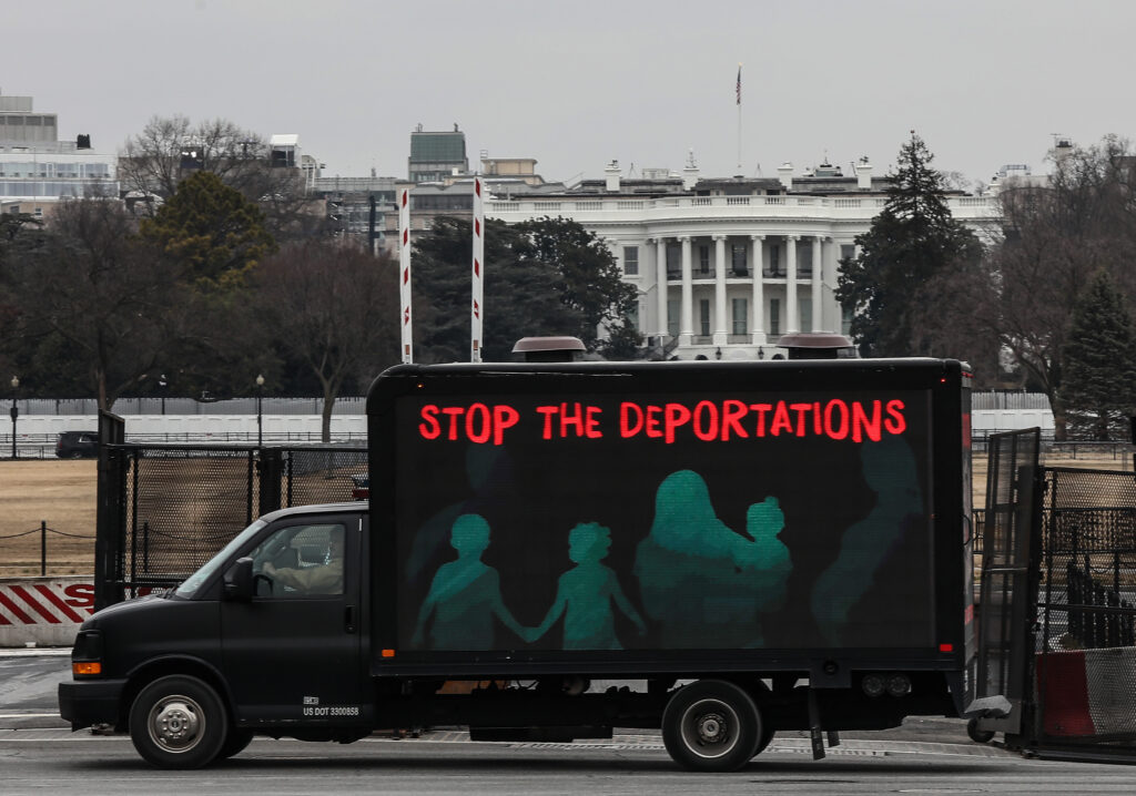 Democrats are unveiling Biden-backed legislation Thursday morning to overhaul the immigration system, which includes setting up a path to citizenship for undocumented immigrants. An L.E.D. truck displaying messages expressing concern over the continuing mass deportations of Black immigrants drives past the White House