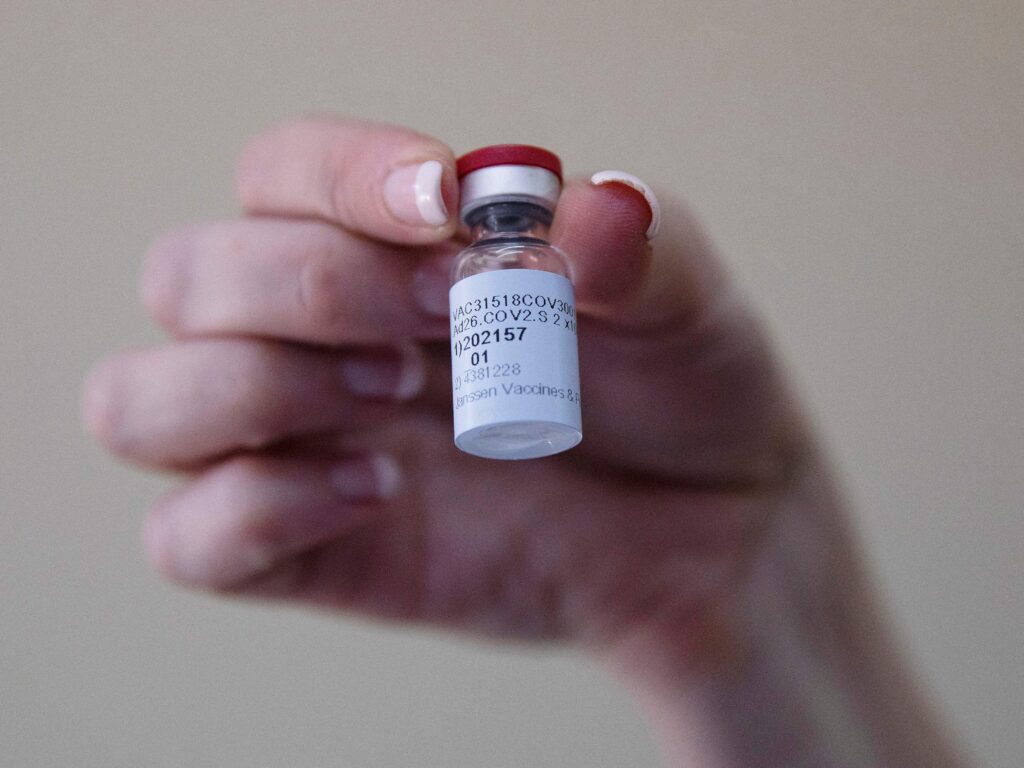 A health care worker holds a vial of the Johnson & Johnson COVID-19 vaccine at Klerksdorp Hospital in Klerksdorp, South Africa, on Feb. 18. A health care worker holds a vial of the Johnson & Johnson COVID-19 vaccine at Klerksdorp Hospital in Klerksdorp, South Africa, on Feb. 18. (Phill Magakoe/AFP via Getty Images)