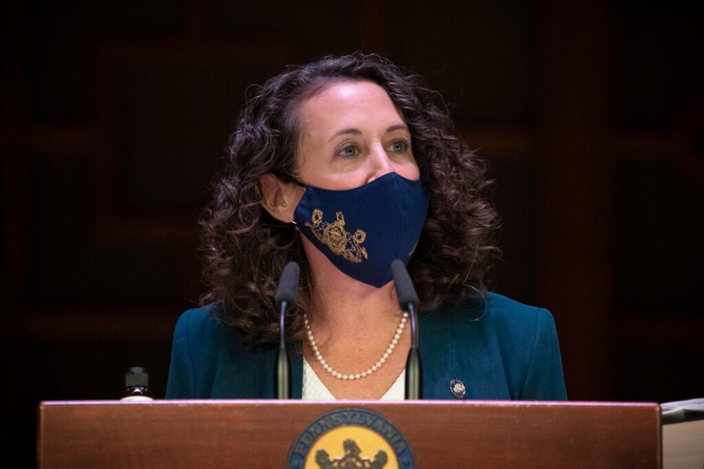 kathy_boockvar_CMS Pennsylvania Secretary Kathy Boockvar, wearing a face mask, addresses the media from behind a podium