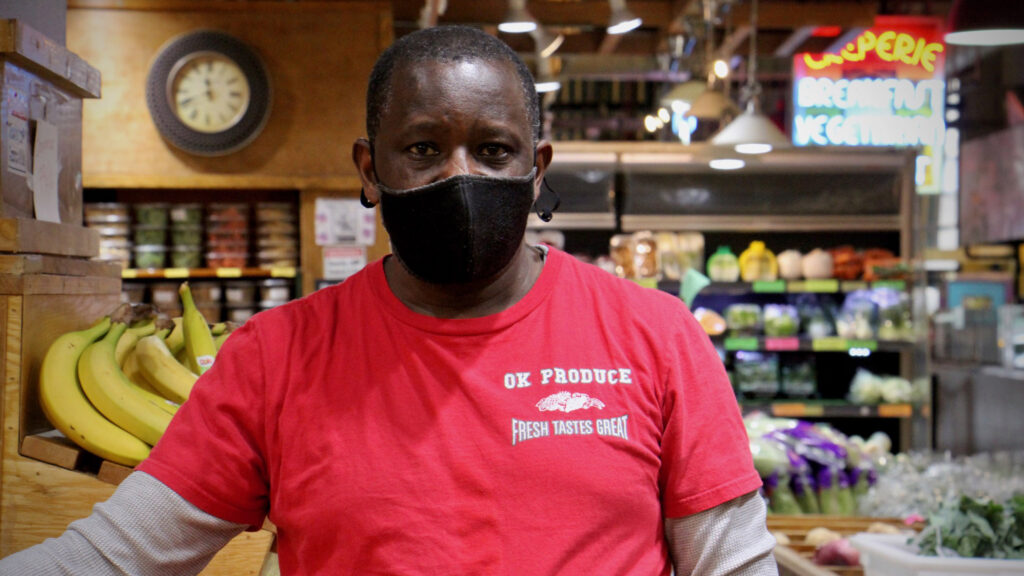 2021 02 19-e lee-sam gatuka-philadelphia reading terminal market Sam Gatuka is the owner of OK Produce in the Reading Terminal Market. (Emma Lee/WHYY)