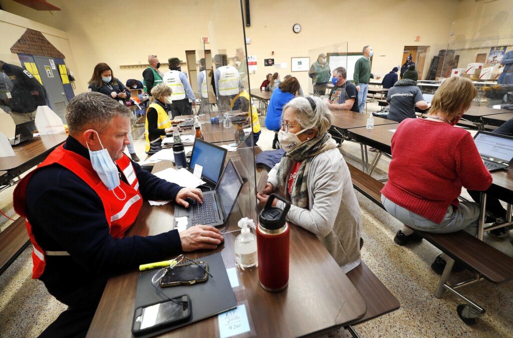 vaccination-rural-pennsylvania-3-1920×1266 This community vaccination clinic in Sullivan County last month could serve as a model for other places in the state where access to vaccine providers and other limitations pose distribution challenges. (Fred Adams/Spotlight PA)