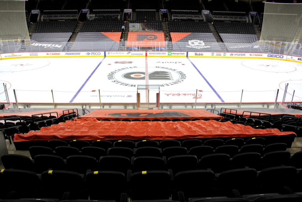 2021 03 05-e lee-philadelphia wells fargo center-stadium opens to fans center ice No one will be allowed to sit in the first ten rows around the ice in order to protect players, who have traded their plexiglass enclosures for netting to improve air circulation. (Emma Lee/WHYY)