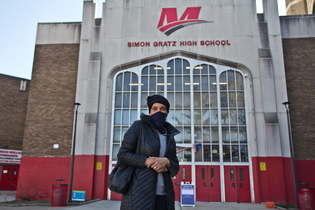 2021 03 15 k paynter gratz COVID vaccination clinic-9 Vincenteen Miller Paige wearing a face mask outside of Simon Gratz High School Mastery Charter