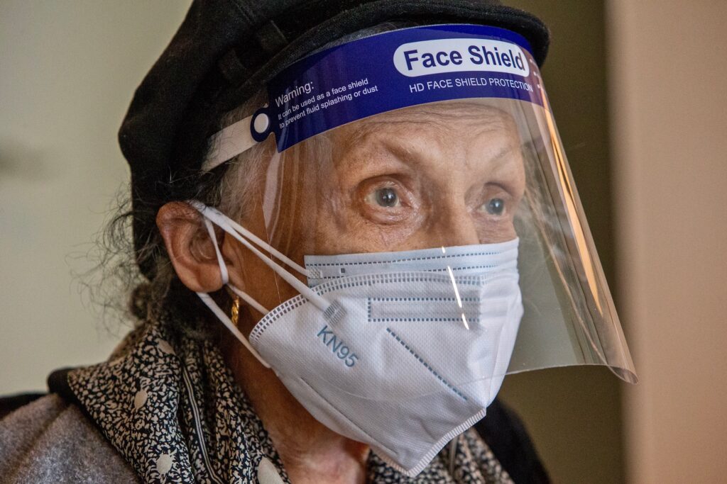 2021 03 19-pool-ruth hopson-philadelphia river park house-oldest philadelphian vaccine Philadelphia's oldest living resident, Ruth Hopson, 108, received her Pfizer two dose COVID-19 vaccine at her home in the River Park House, Conshohocken Avenue, Philadelphia on Friday afternoon, March 19, 2021. Her daughters Merle Hopson and Carla Hopson-Tyson were vaccinated also. ( ALEJANDRO A. ALVAREZ / POOL, The Philadelphia Inquirer )
