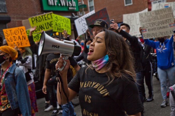 Raquel Villanueva helped to organize and lead a solidarity rally and march at 10th and Vine Streets in Philadelphia on March 25, 2021. (Kimberly Paynter/WHYY)