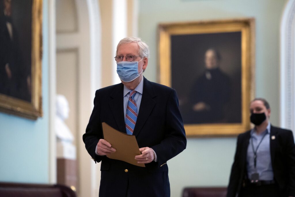 AP21064529798612 Senate Minority Leader Mitch McConnell, R-Ky., arrives at the Capitol in Washington, Friday, March 5, 2021, as the Senate steers toward a voting marathon on the $1.9 trillion COVID-19 relief bill that's expected to end with the chamber's approval of the measure. (AP Photo/J. Scott Applewhite)